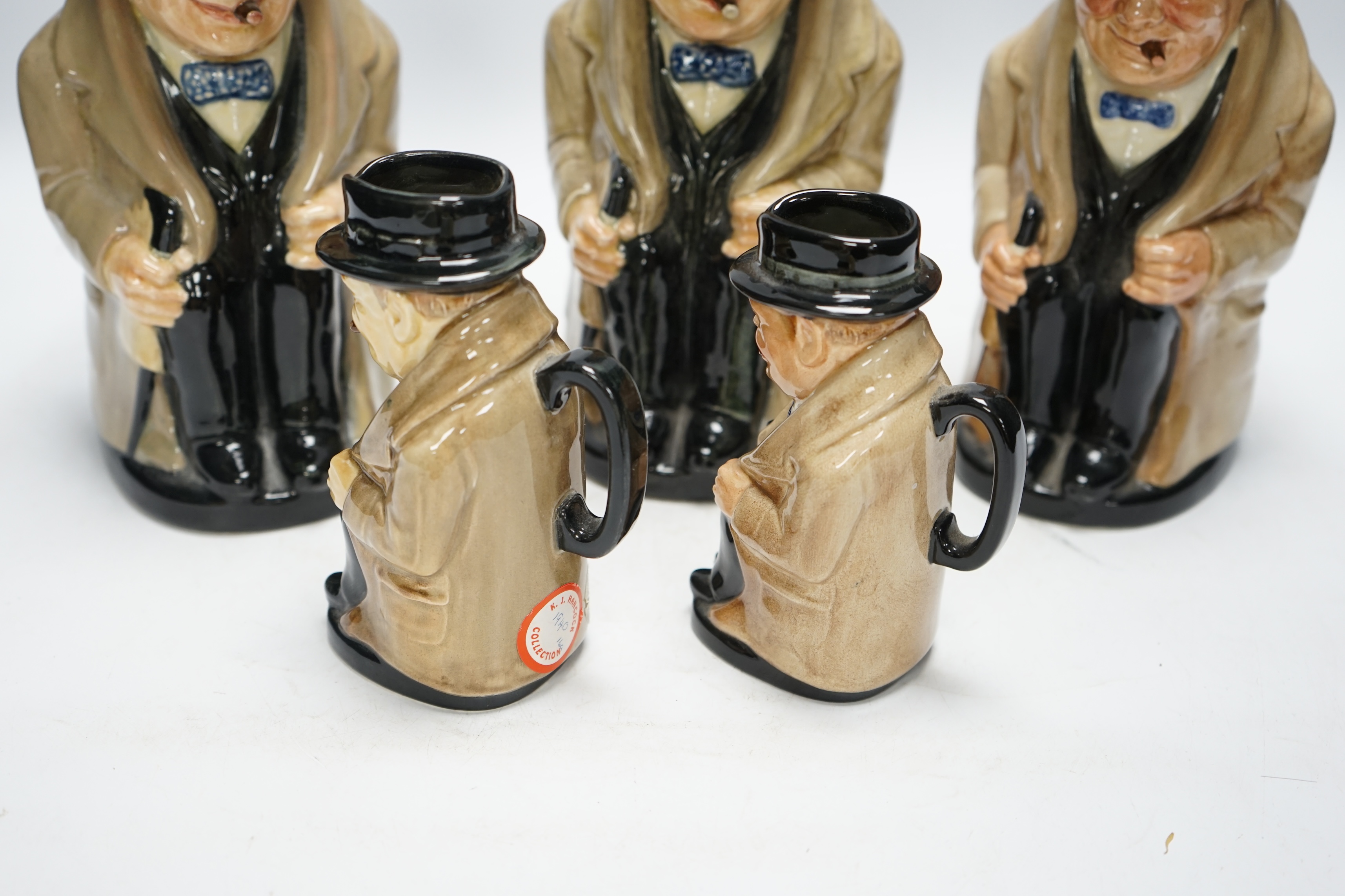 A group of six Doulton Winston Churchill character jugs, largest 23cm high. Condition - good, some crazing